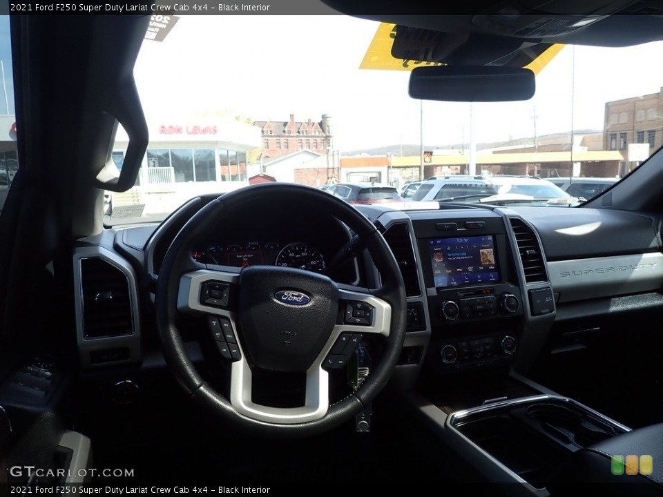 Black Interior Dashboard for the 2021 Ford F250 Super Duty Lariat Crew Cab 4x4 #144120249