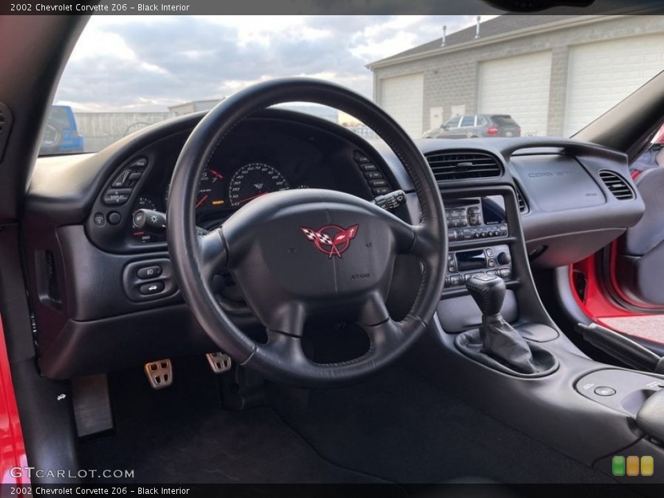 Black Interior Steering Wheel for the 2002 Chevrolet Corvette Z06 #144133996