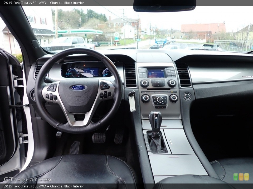 Charcoal Black Interior Dashboard for the 2015 Ford Taurus SEL AWD #144137389