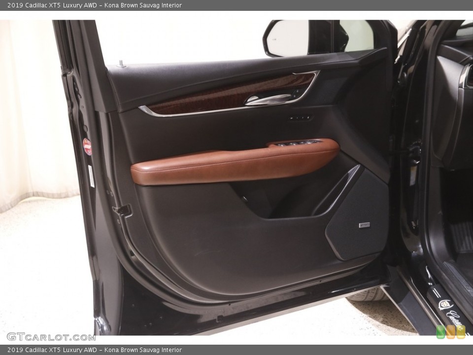 Kona Brown Sauvag Interior Door Panel for the 2019 Cadillac XT5 Luxury AWD #144149070