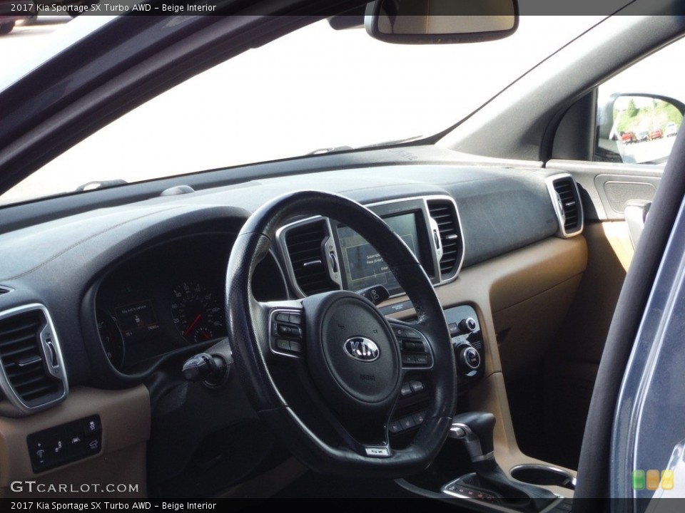 Beige Interior Dashboard for the 2017 Kia Sportage SX Turbo AWD #144200250