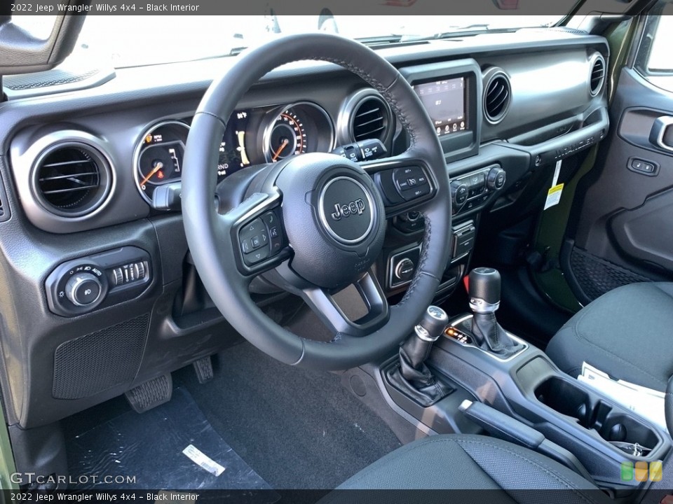 Black Interior Dashboard for the 2022 Jeep Wrangler Willys 4x4 #144244083
