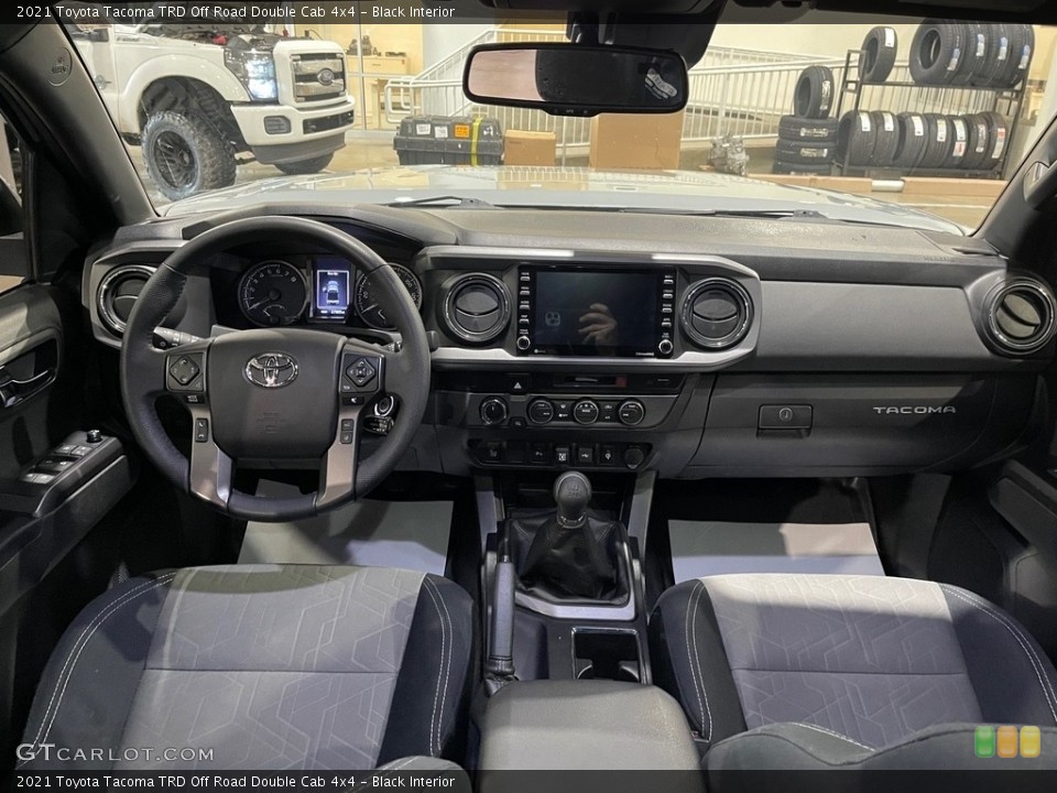 Black Interior Dashboard for the 2021 Toyota Tacoma TRD Off Road Double Cab 4x4 #144256378