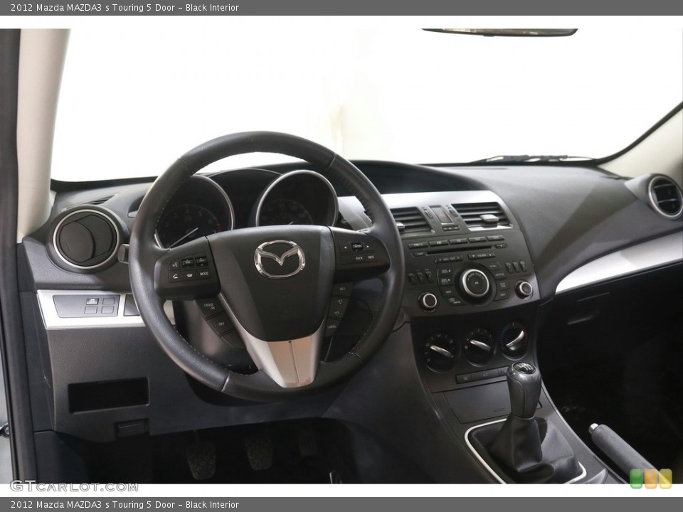 Black Interior Dashboard for the 2012 Mazda MAZDA3 s Touring 5 Door #144349600