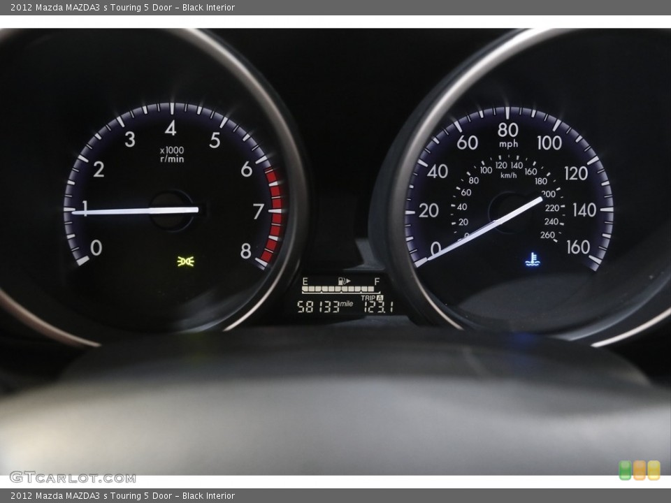 Black Interior Gauges for the 2012 Mazda MAZDA3 s Touring 5 Door #144349630