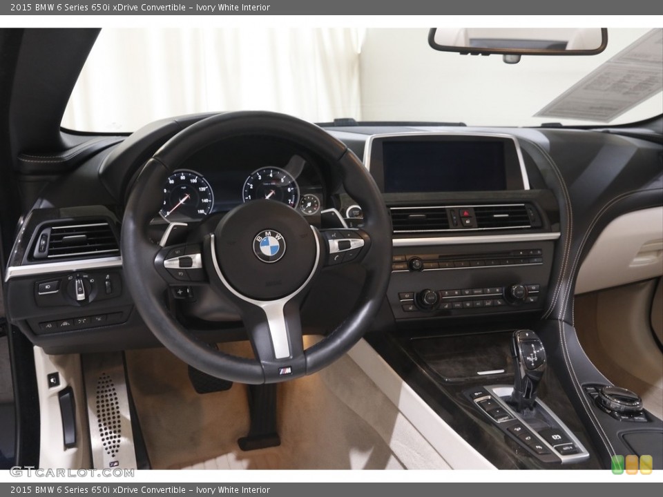 Ivory White Interior Dashboard for the 2015 BMW 6 Series 650i xDrive Convertible #144399117