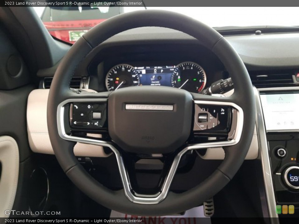 Light Oyster/Ebony Interior Steering Wheel for the 2023 Land Rover Discovery Sport S R-Dynamic #144403685