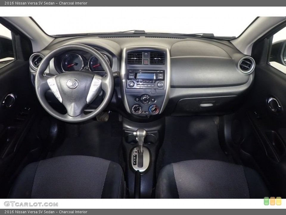 Charcoal Interior Dashboard for the 2016 Nissan Versa SV Sedan #144408933