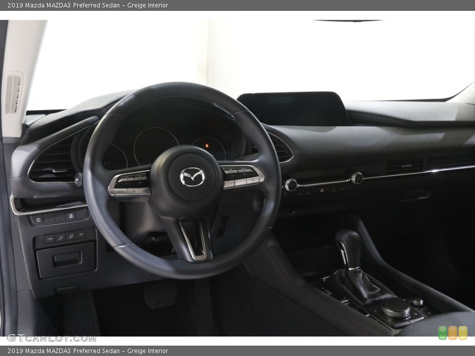 Greige Interior Dashboard for the 2019 Mazda MAZDA3 Preferred Sedan #144461443