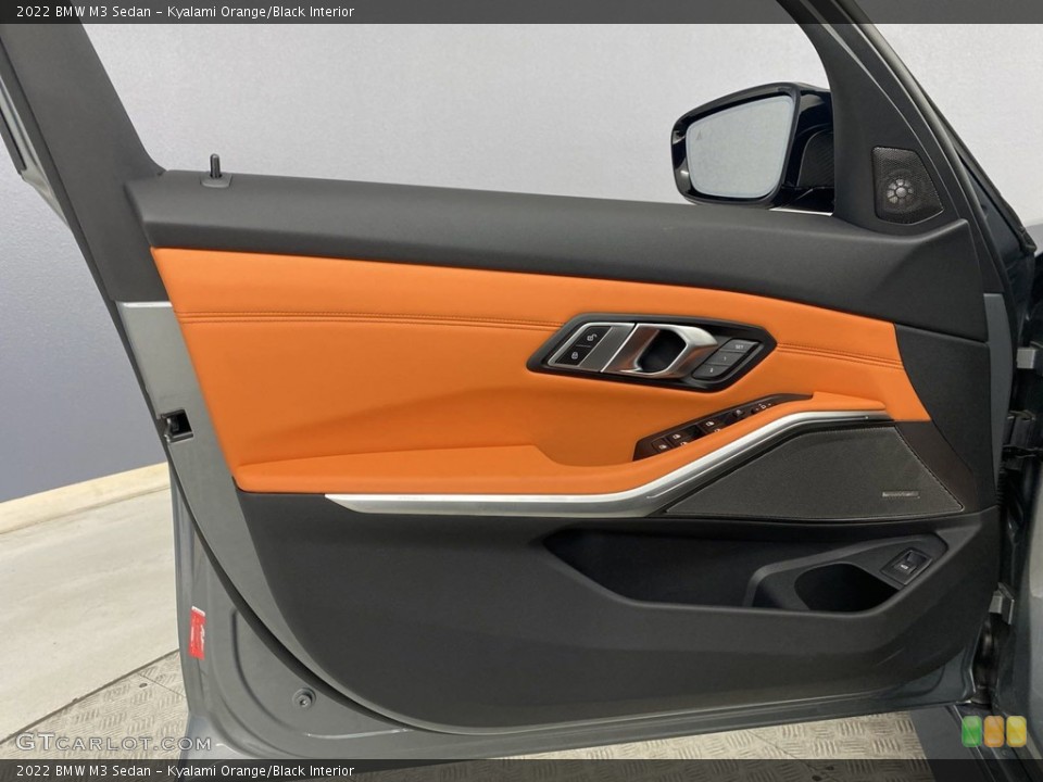 Kyalami Orange/Black Interior Door Panel for the 2022 BMW M3 Sedan #144546470