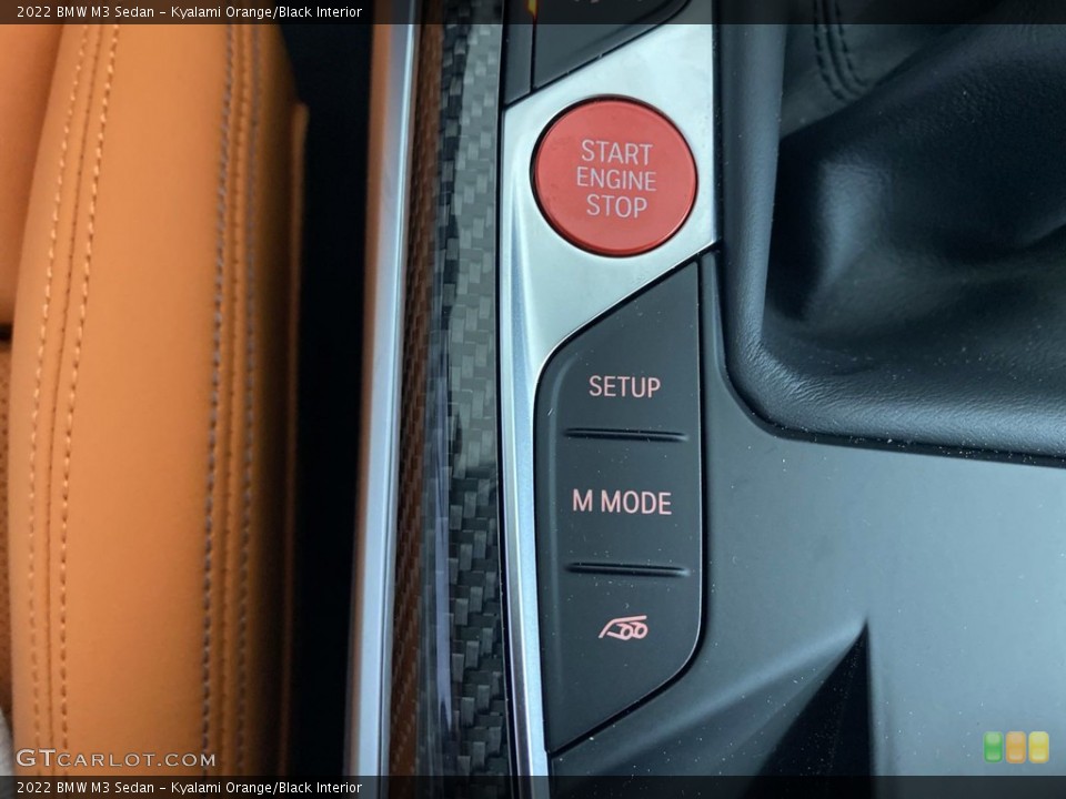 Kyalami Orange/Black Interior Controls for the 2022 BMW M3 Sedan #144546560