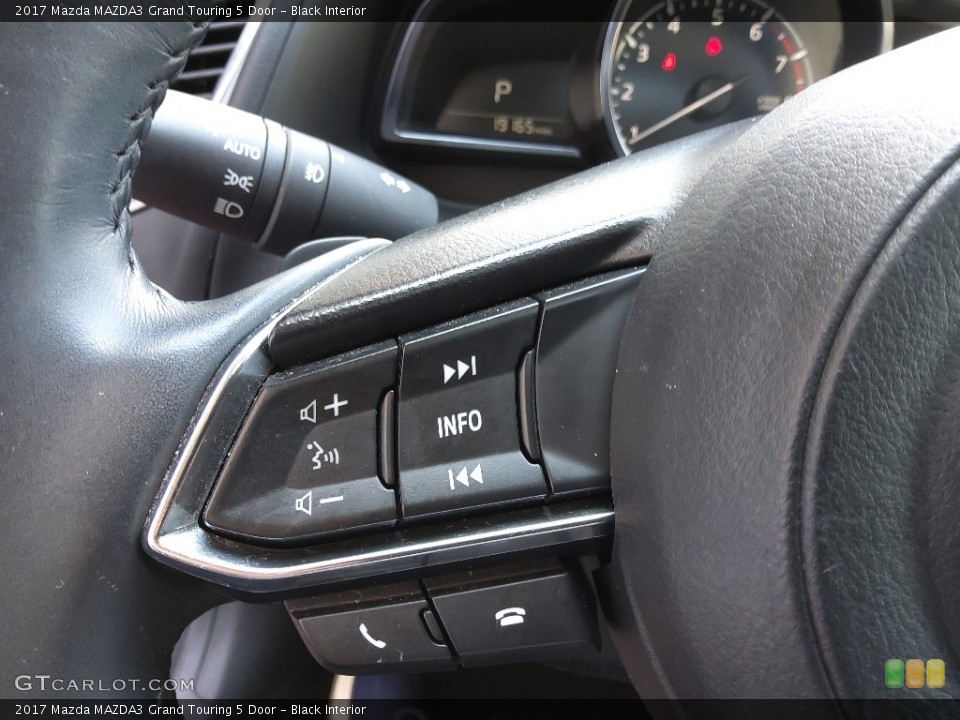 Black Interior Steering Wheel for the 2017 Mazda MAZDA3 Grand Touring 5 Door #144556243