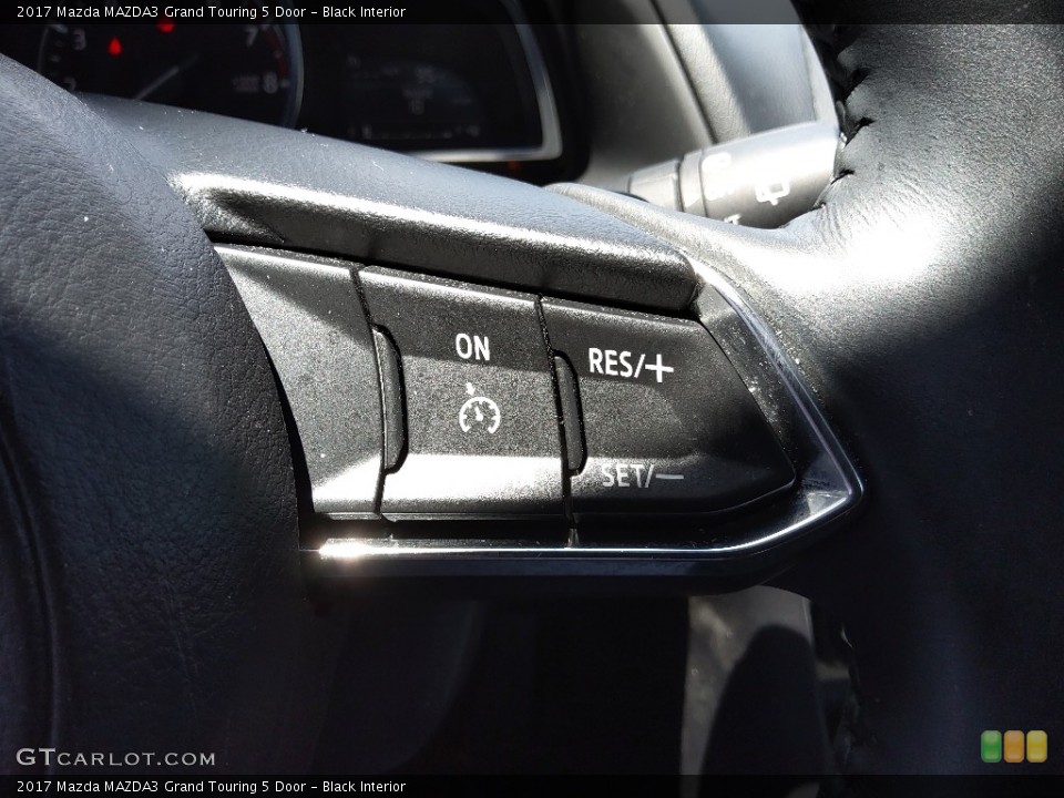 Black Interior Steering Wheel for the 2017 Mazda MAZDA3 Grand Touring 5 Door #144556270