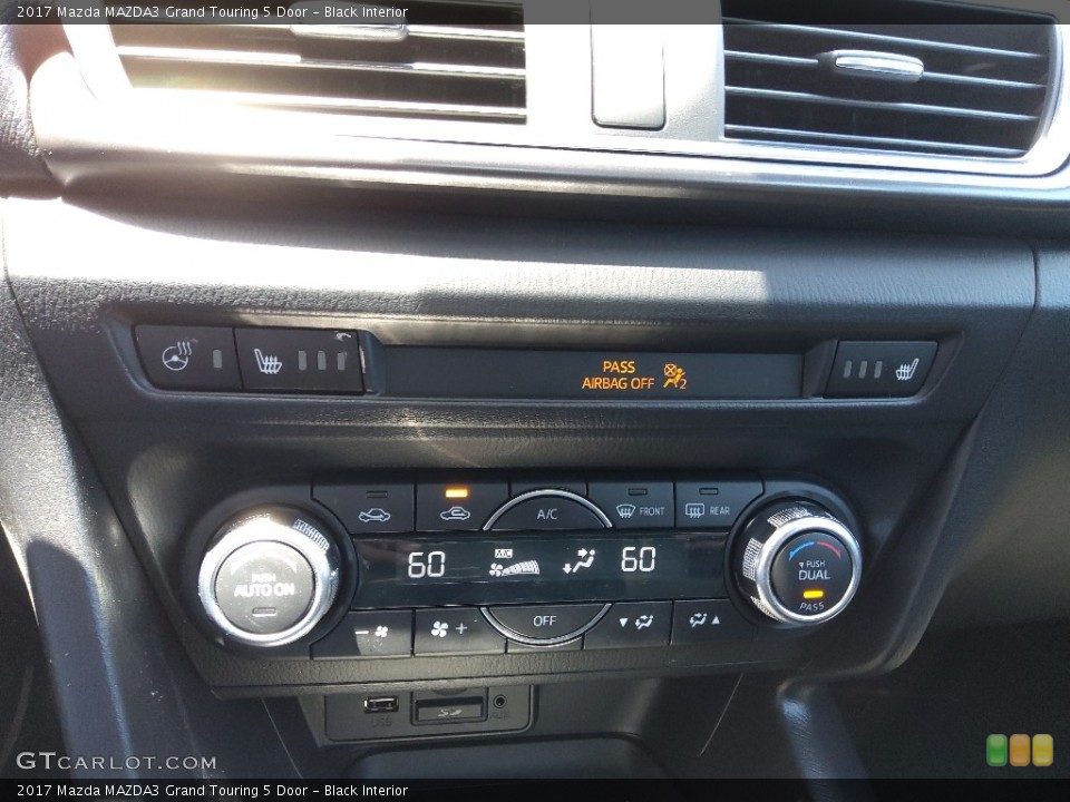 Black Interior Controls for the 2017 Mazda MAZDA3 Grand Touring 5 Door #144556408