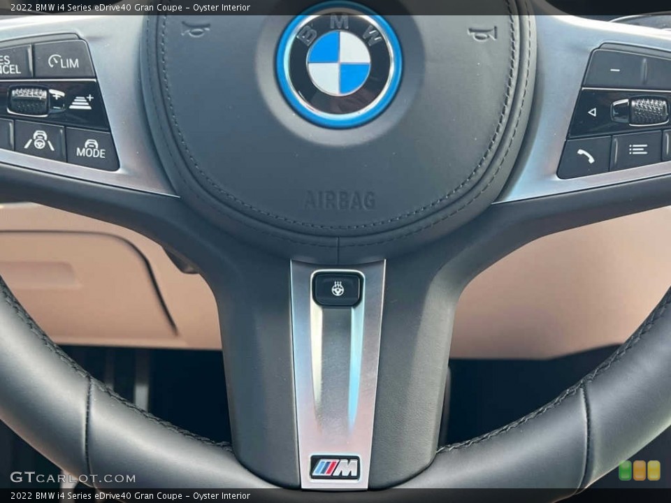 Oyster Interior Steering Wheel for the 2022 BMW i4 Series eDrive40 Gran Coupe #144567294