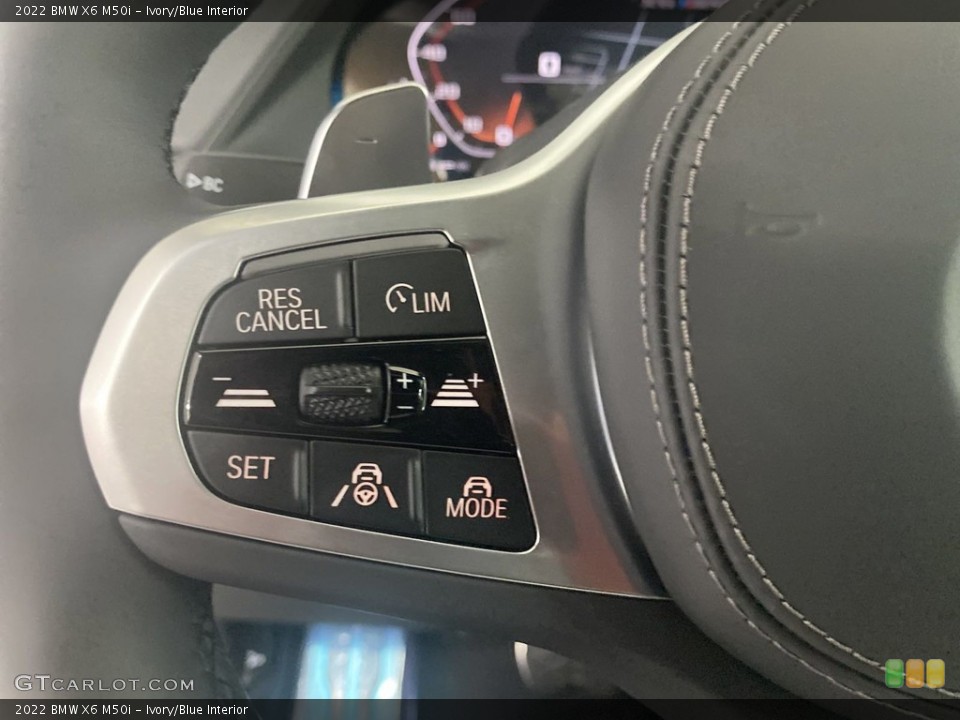 Ivory/Blue Interior Steering Wheel for the 2022 BMW X6 M50i #144569875