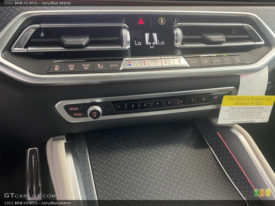 Ivory/Blue Interior Controls for the 2022 BMW X6 M50i #144570040