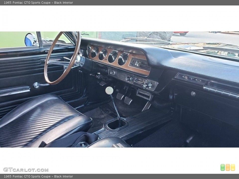 Black Interior Dashboard for the 1965 Pontiac GTO Sports Coupe #144581945
