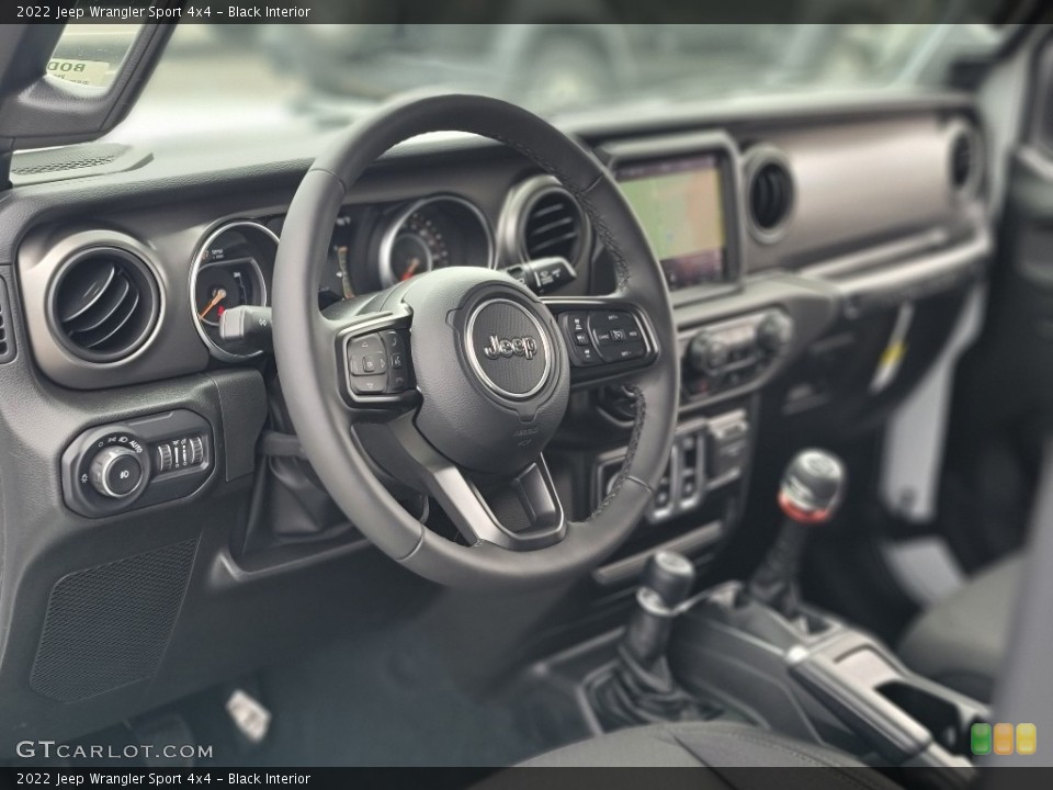 Black Interior Dashboard for the 2022 Jeep Wrangler Sport 4x4 #144664182