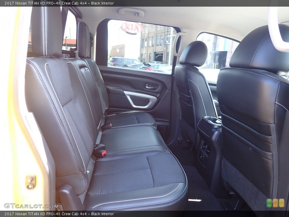 Black Interior Rear Seat for the 2017 Nissan TITAN XD PRO-4X Crew Cab 4x4 #144772219