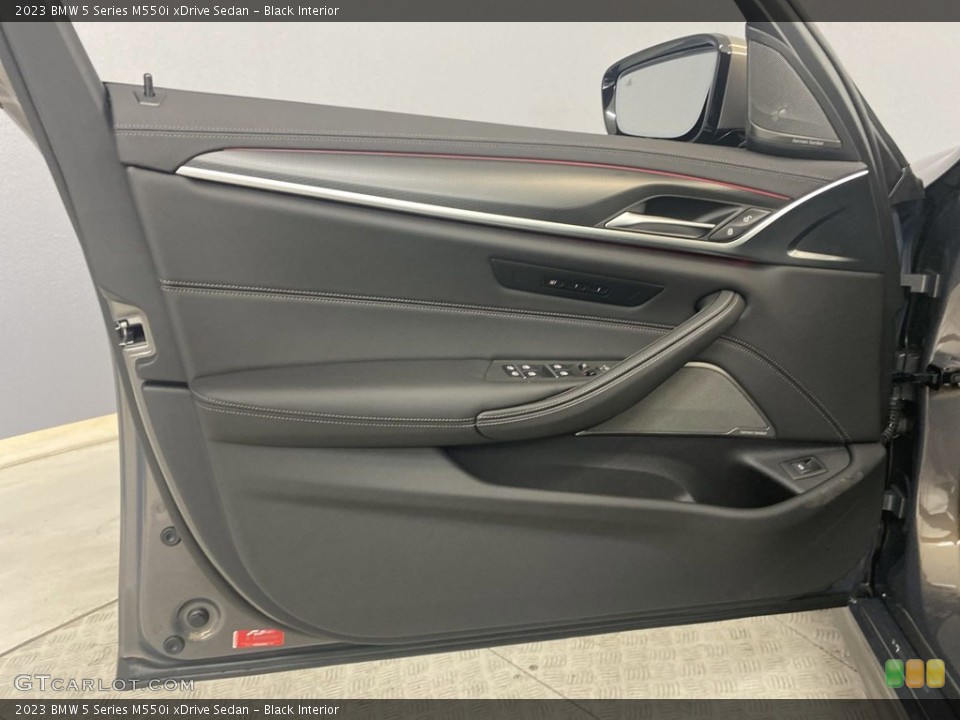 Black Interior Door Panel for the 2023 BMW 5 Series M550i xDrive Sedan #144799957
