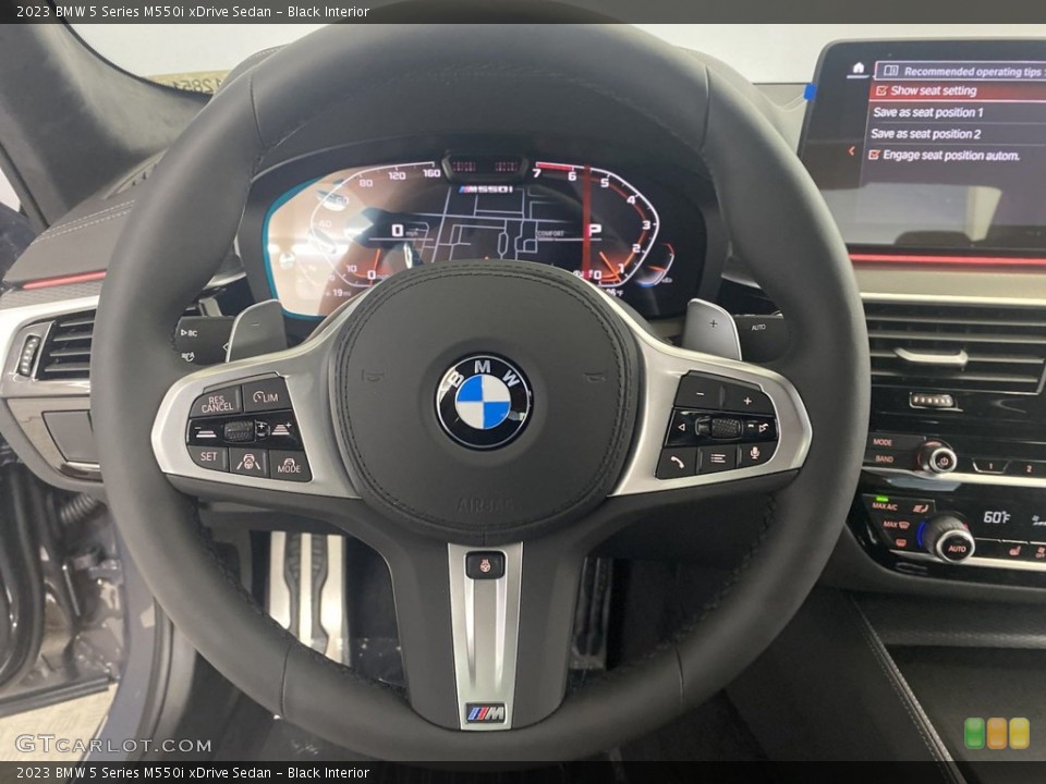 Black Interior Steering Wheel for the 2023 BMW 5 Series M550i xDrive Sedan #144800059