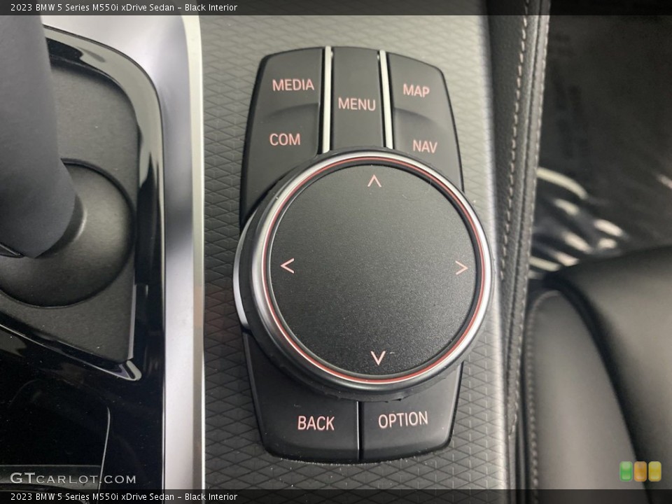 Black Interior Controls for the 2023 BMW 5 Series M550i xDrive Sedan #144800311