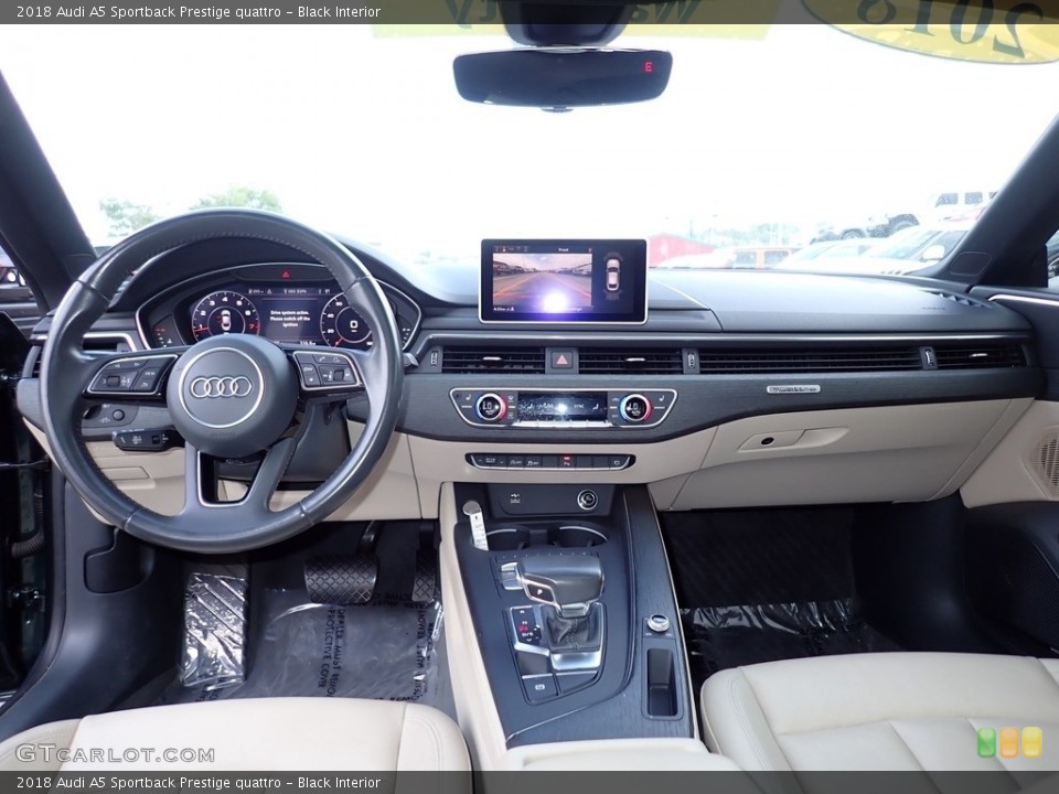Black Interior Dashboard for the 2018 Audi A5 Sportback Prestige quattro #144830396