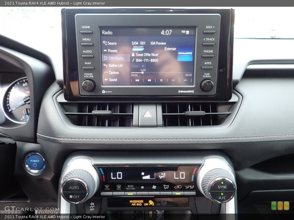 Light Gray Interior Controls for the 2021 Toyota RAV4 XLE AWD Hybrid #144840971