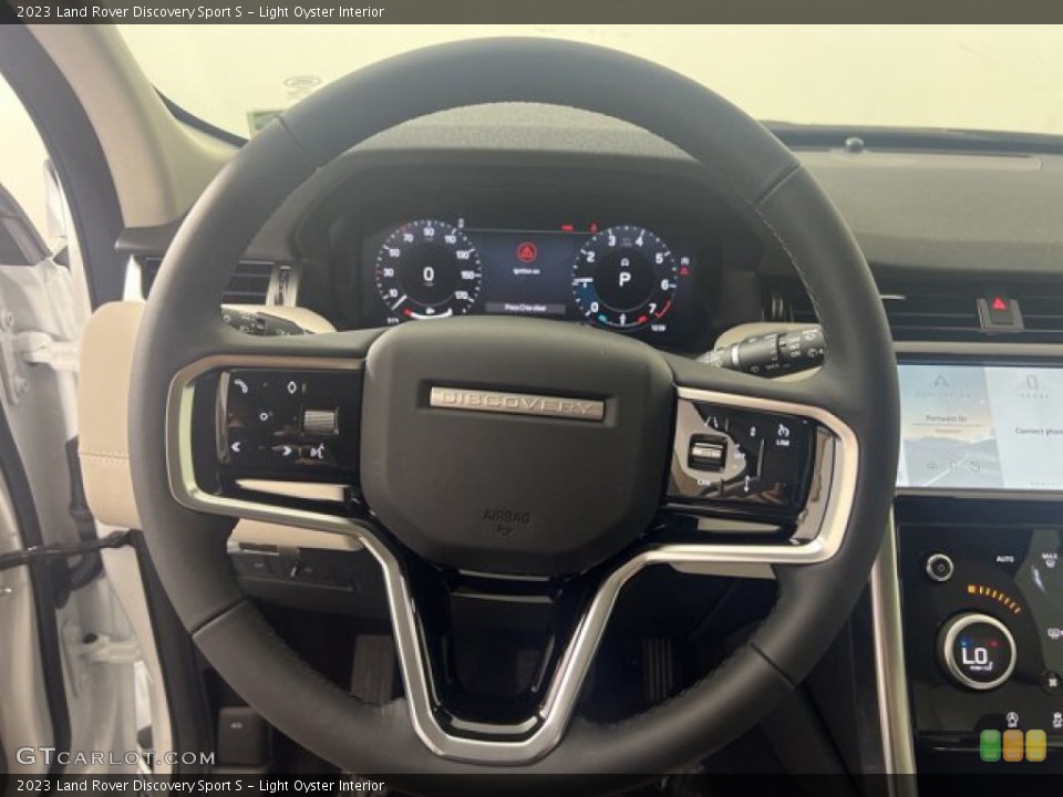 Light Oyster Interior Steering Wheel for the 2023 Land Rover Discovery Sport S #144881255