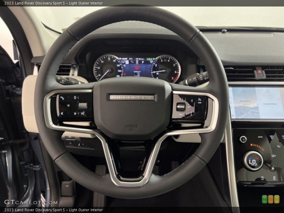 Light Oyster Interior Steering Wheel for the 2023 Land Rover Discovery Sport S #144881729