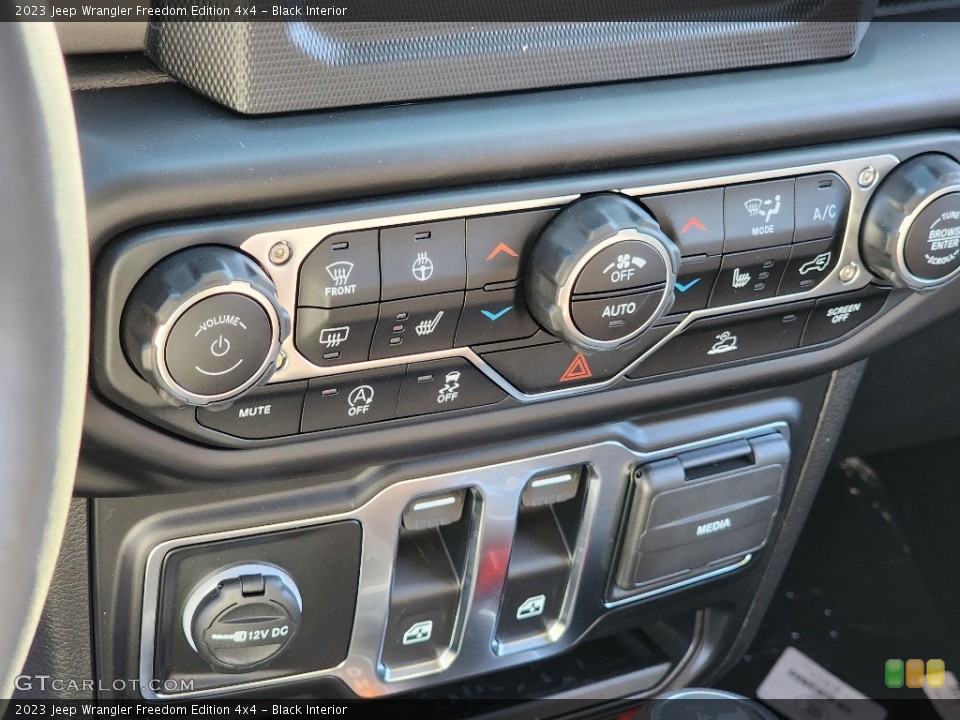 Black Interior Controls for the 2023 Jeep Wrangler Freedom Edition 4x4 #145137975