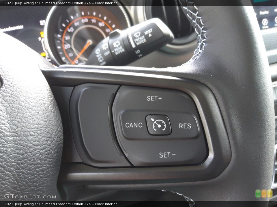 Black Interior Steering Wheel for the 2023 Jeep Wrangler Unlimited Freedom Edition 4x4 #145151958
