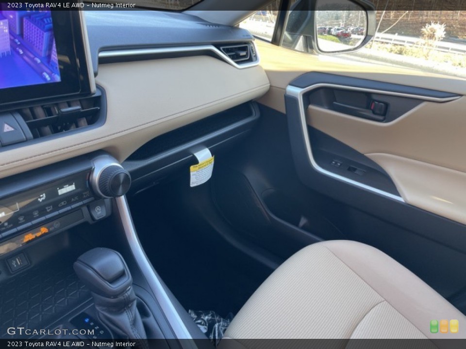 Nutmeg Interior Dashboard for the 2023 Toyota RAV4 LE AWD #145211775