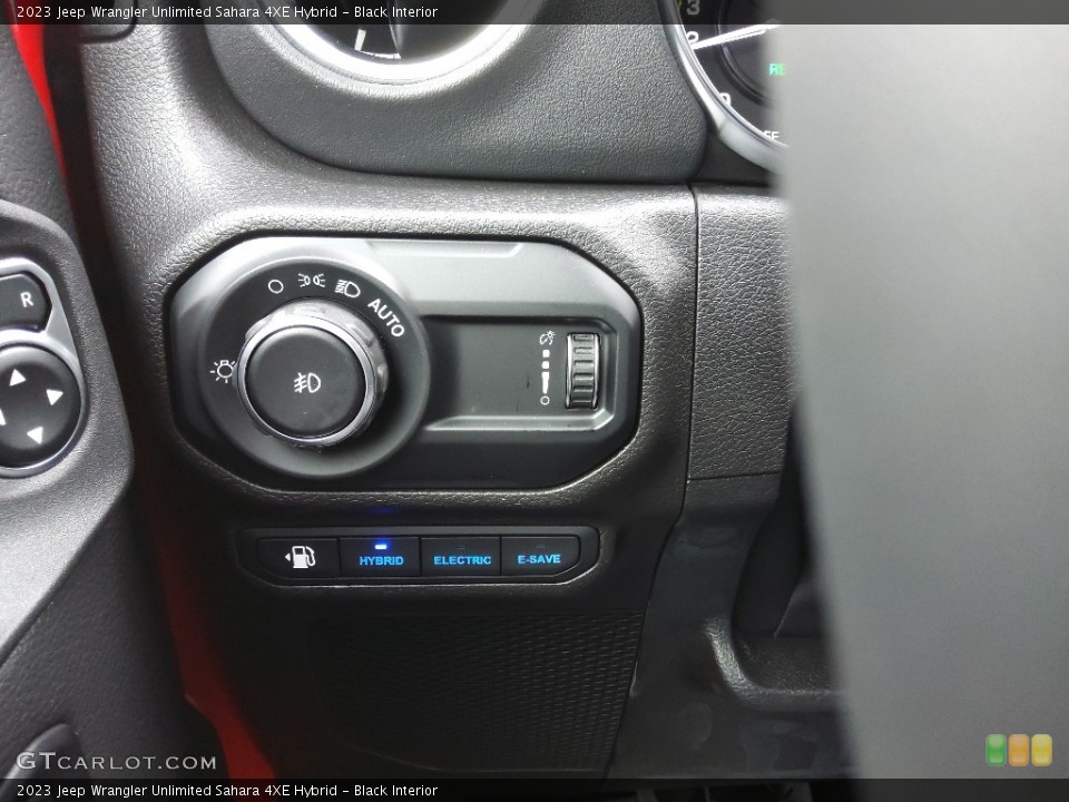 Black Interior Controls for the 2023 Jeep Wrangler Unlimited Sahara 4XE Hybrid #145222928