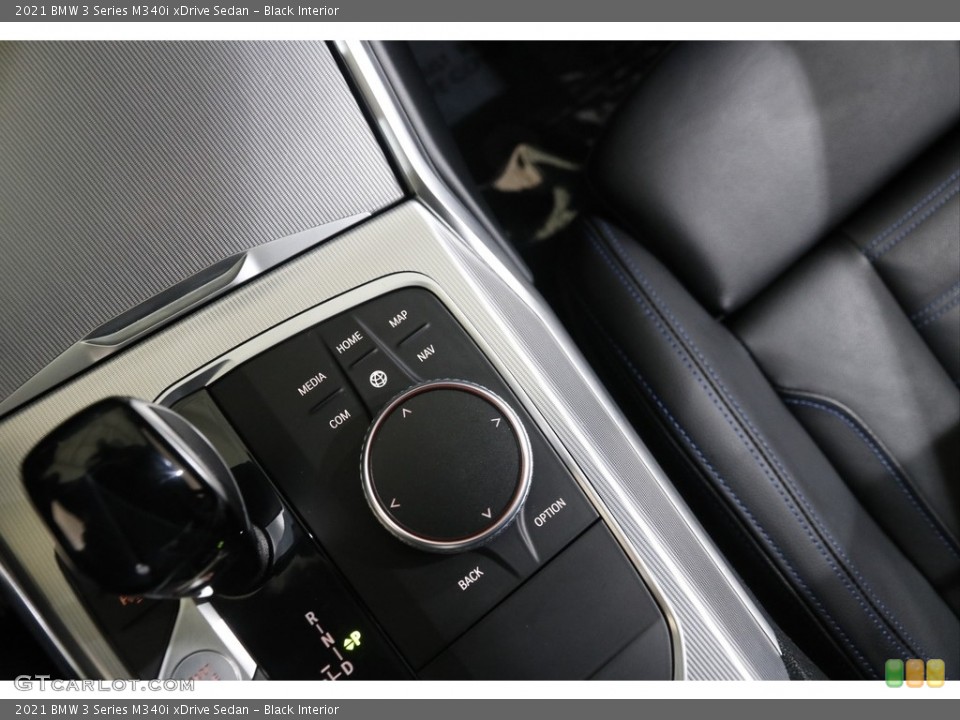 Black Interior Controls for the 2021 BMW 3 Series M340i xDrive Sedan #145234322