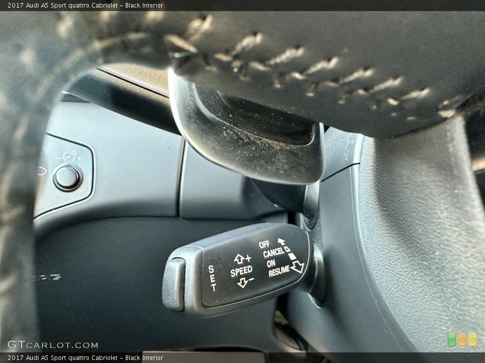 Black Interior Steering Wheel for the 2017 Audi A5 Sport quattro Cabriolet #145337898