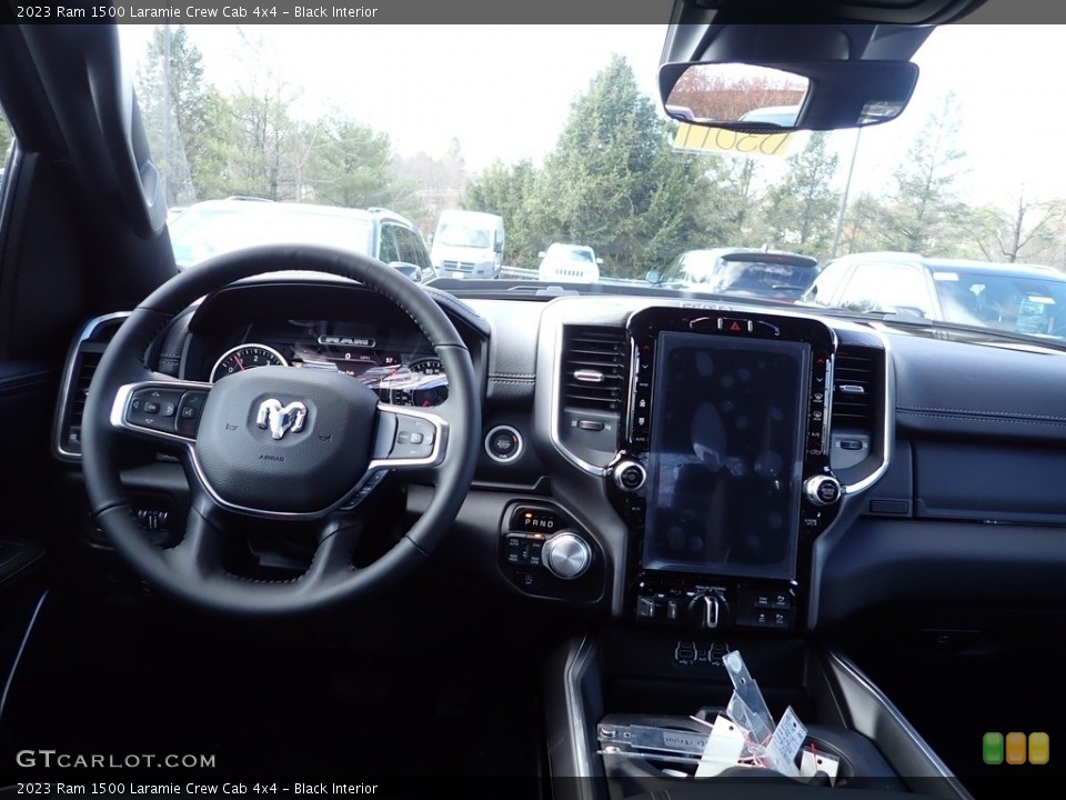 Black Interior Dashboard for the 2023 Ram 1500 Laramie Crew Cab 4x4 #145432626