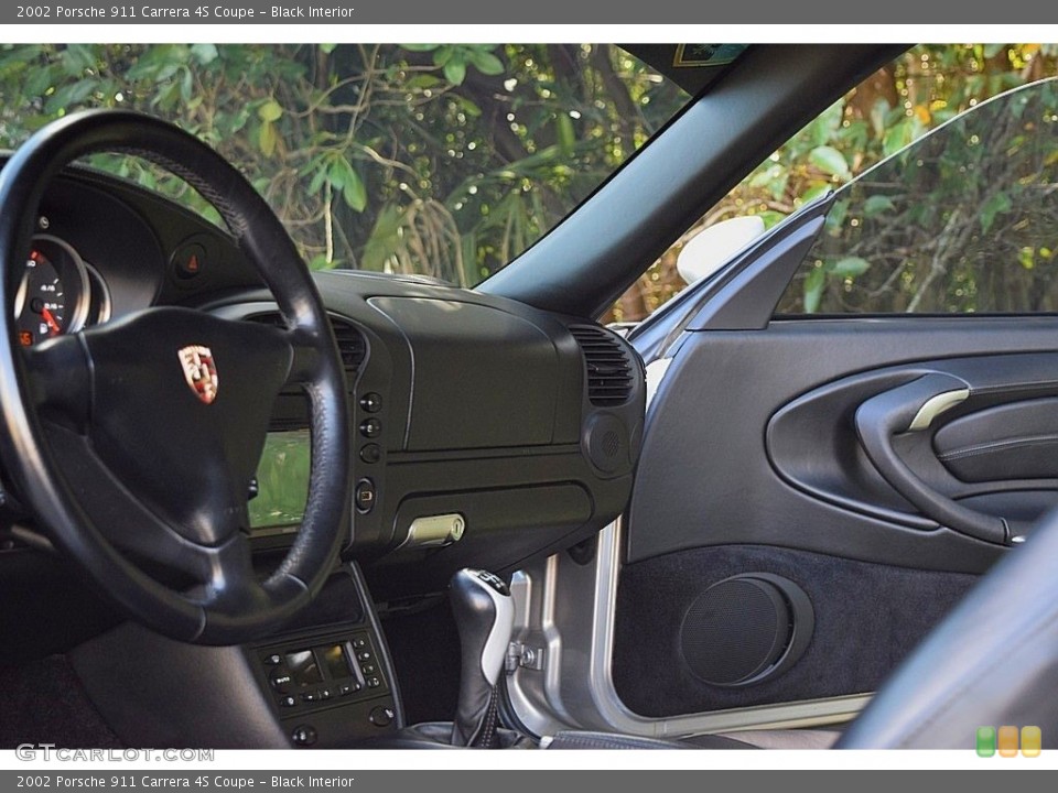 Black Interior Dashboard for the 2002 Porsche 911 Carrera 4S Coupe #145471467