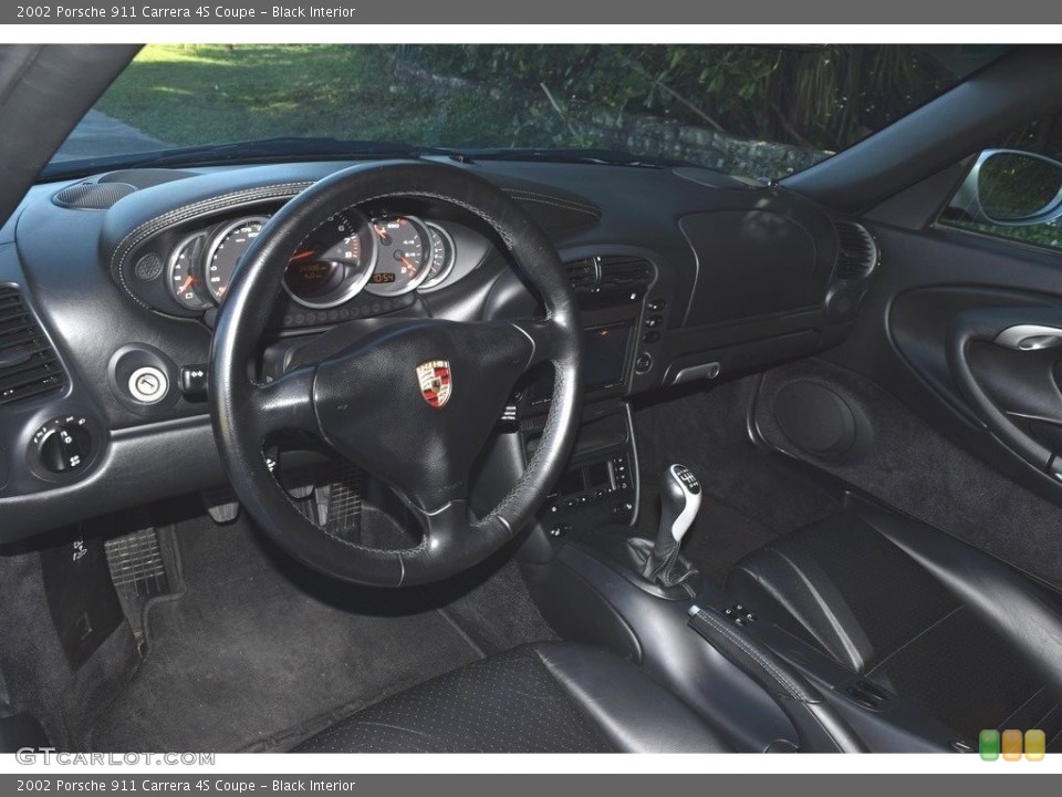 Black Interior Dashboard for the 2002 Porsche 911 Carrera 4S Coupe #145471473