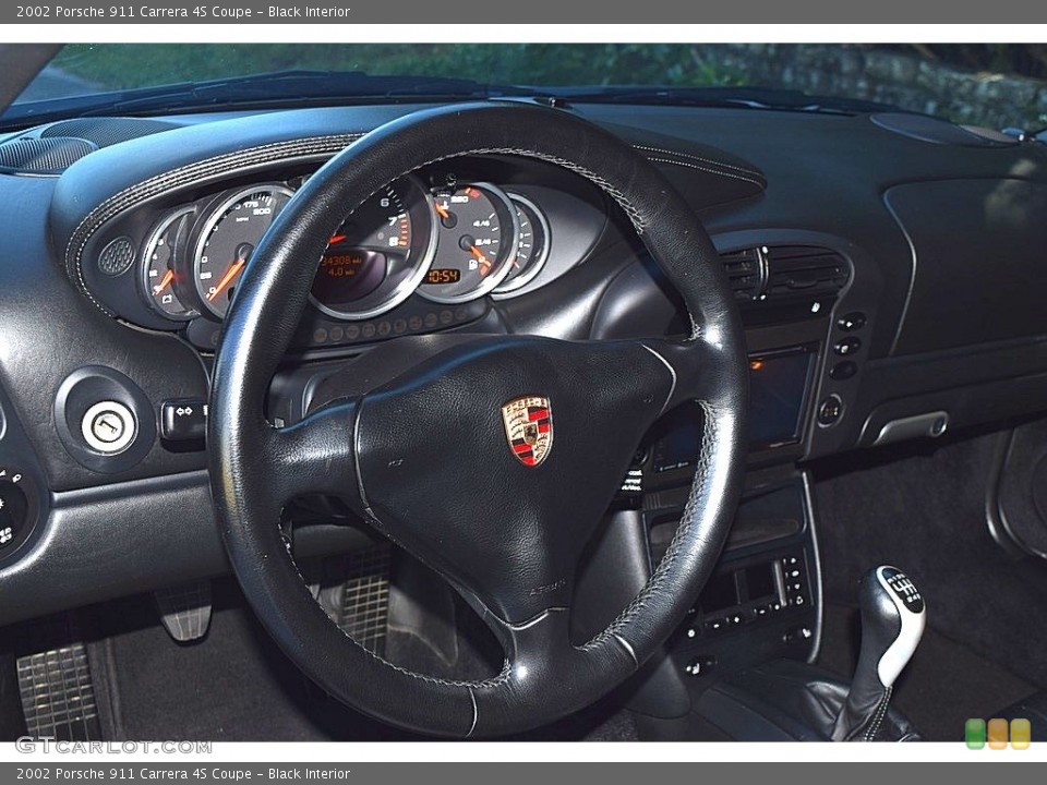 Black Interior Steering Wheel for the 2002 Porsche 911 Carrera 4S Coupe #145471476