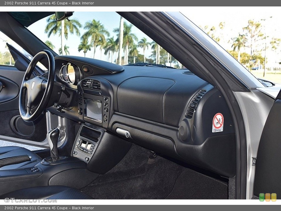 Black Interior Dashboard for the 2002 Porsche 911 Carrera 4S Coupe #145471497
