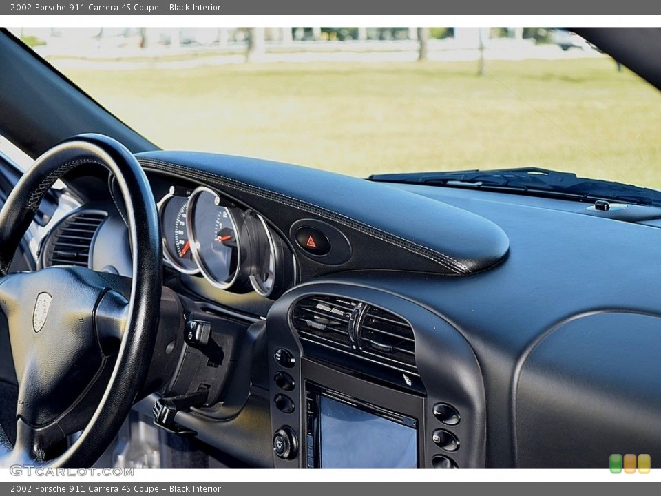 Black Interior Dashboard for the 2002 Porsche 911 Carrera 4S Coupe #145471506