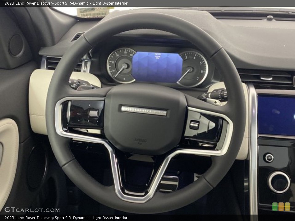 Light Oyster Interior Steering Wheel for the 2023 Land Rover Discovery Sport S R-Dynamic #145478395