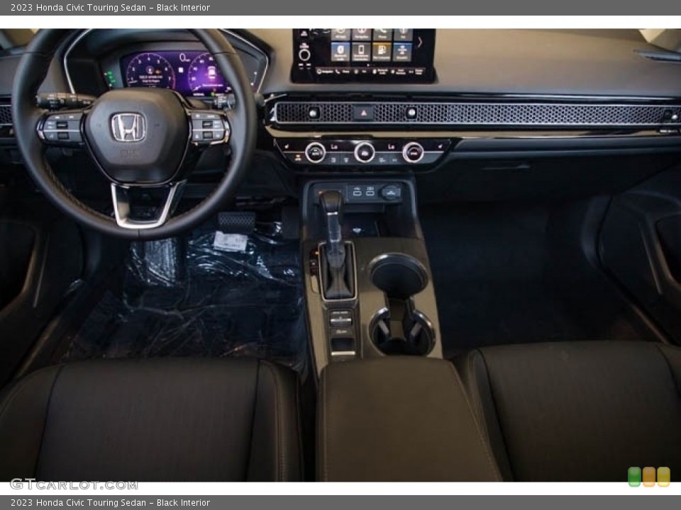 Black Interior Dashboard for the 2023 Honda Civic Touring Sedan #145513185