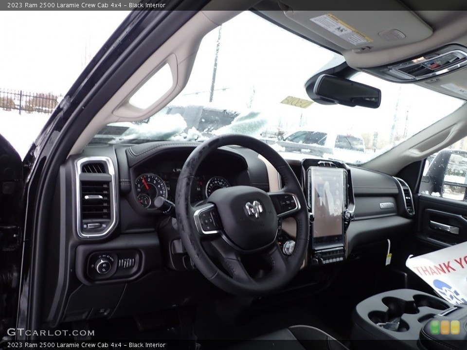 Black Interior Dashboard for the 2023 Ram 2500 Laramie Crew Cab 4x4 #145532766