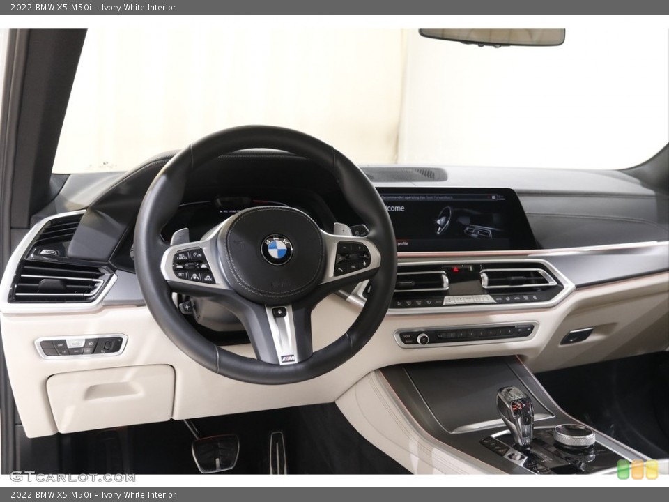 Ivory White Interior Dashboard for the 2022 BMW X5 M50i #145557293