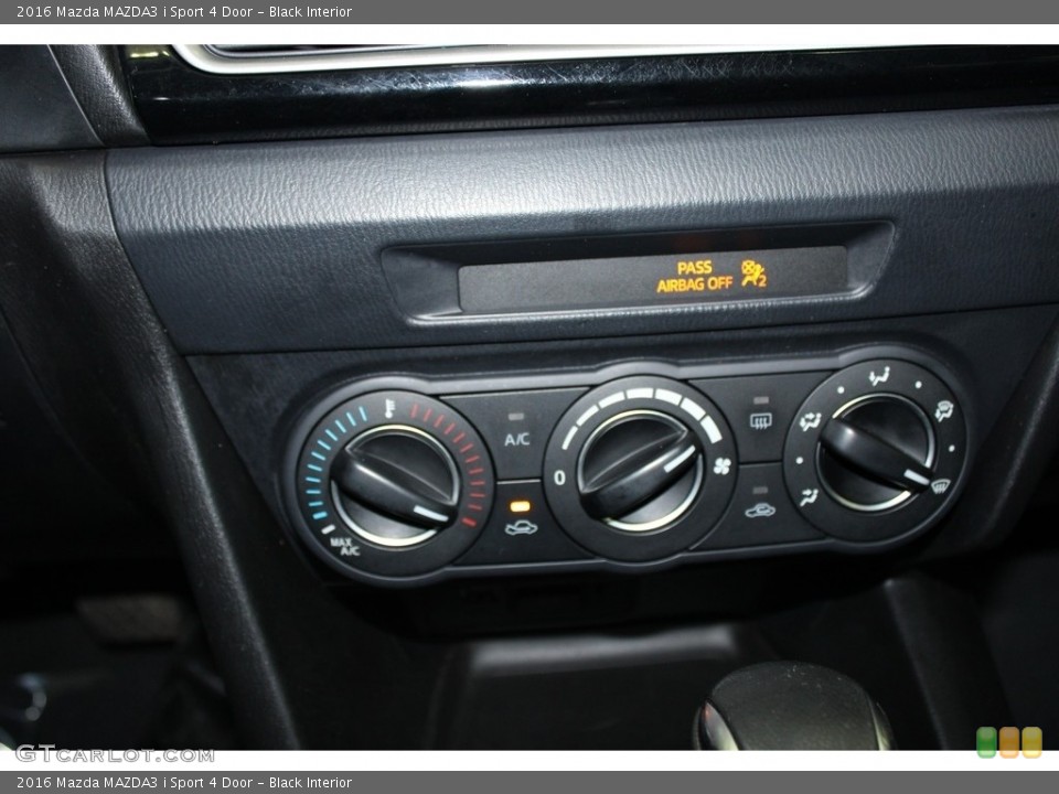 Black Interior Controls for the 2016 Mazda MAZDA3 i Sport 4 Door #145570494