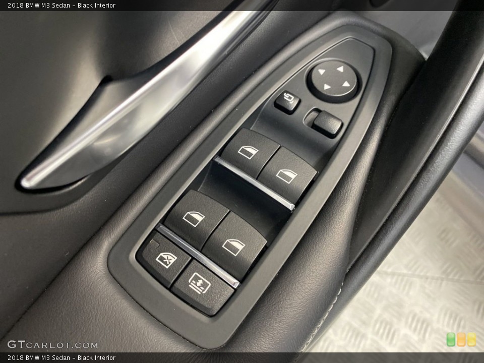 Black Interior Controls for the 2018 BMW M3 Sedan #145575101