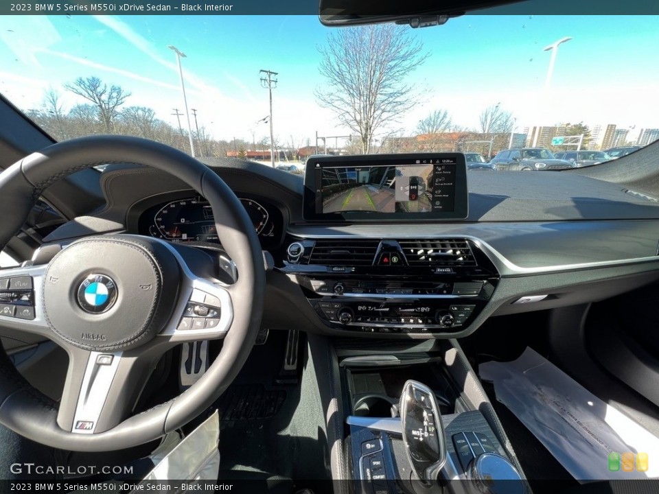 Black Interior Dashboard for the 2023 BMW 5 Series M550i xDrive Sedan #145588286